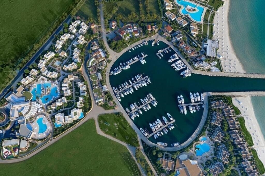 Фотографія Porto Sani Village 5*