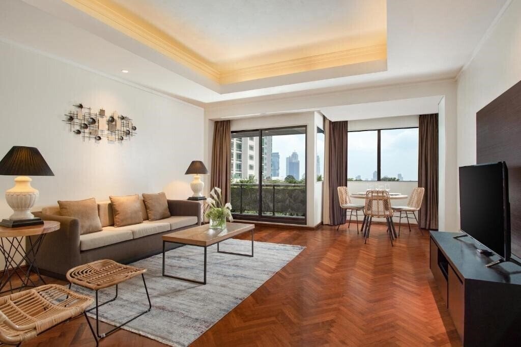 Фотографія Aston At Kuningan Suites 4*