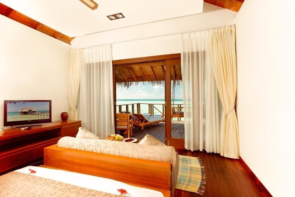 Фото Medhufushi Island Resort (ex. Medhufushi Resort) 4*
