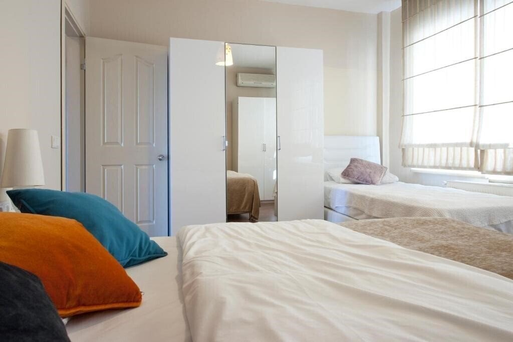 Фотографія Aslan Apartments Istanbul 4*